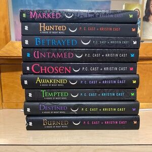 P.C Cast + Kristin Cast fantasy novels.